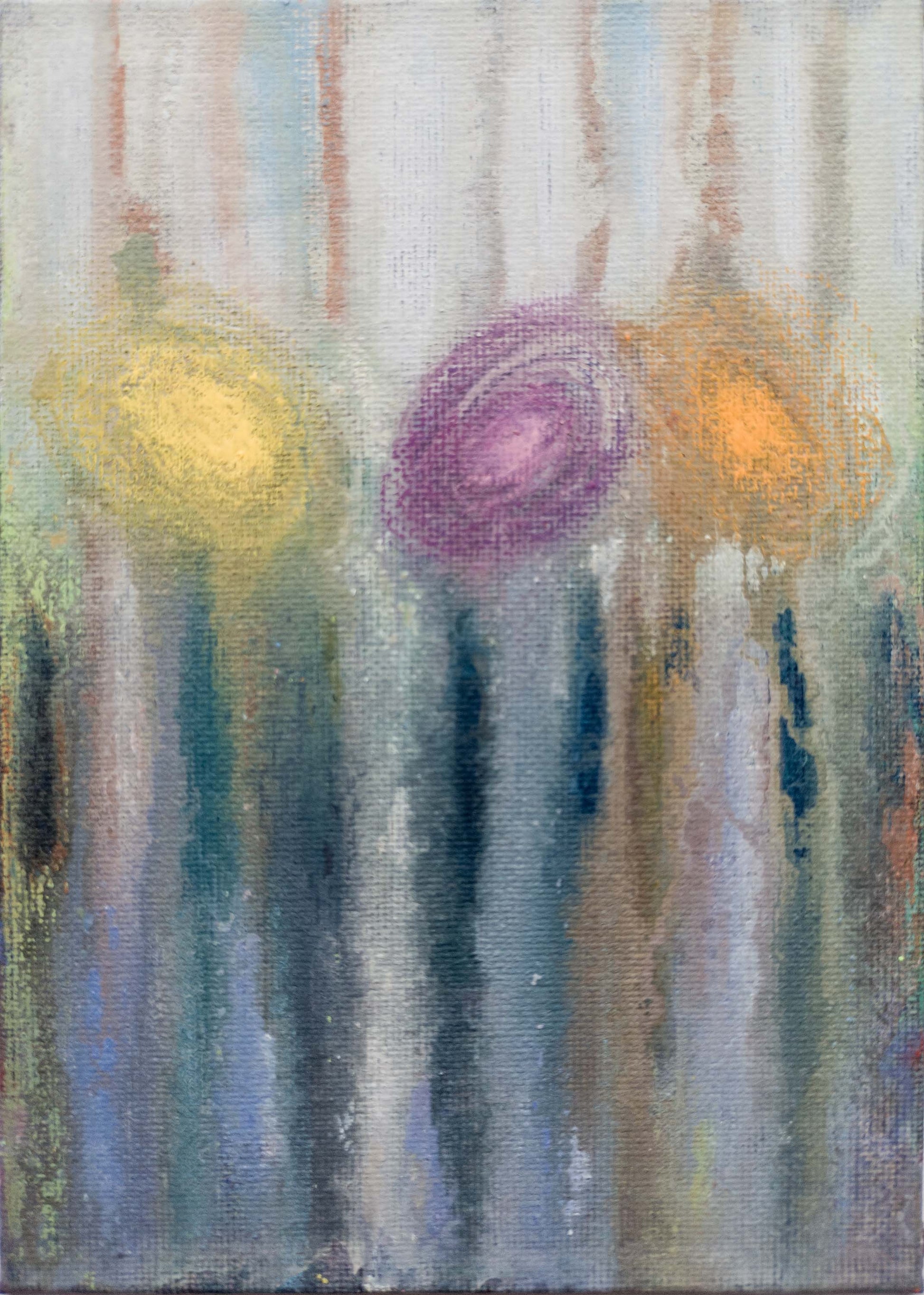 A small abstract painting (5x7 inches) created with water-soluble wax crayons on a gesso-primed canvas board. Soft vertical streaks of blue, grey, and muted green flow downward, blending seamlessly. Three circular forms—yellow, violet, and orange—hover in the upper half, their edges diffused, as though dissolving into the background. The layering of colour and subtle textures create an ethereal, atmospheric quality.